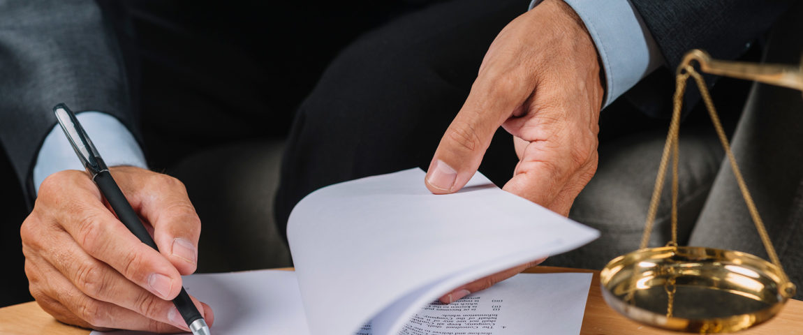 first-plane-lawyer-male-signing-document